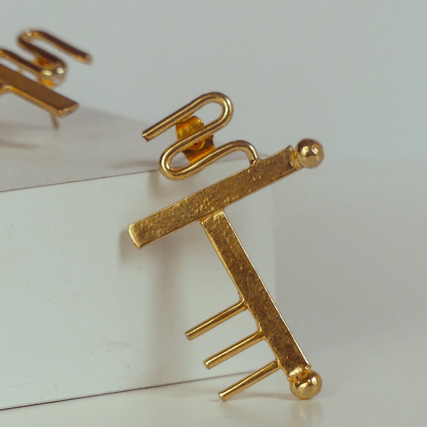 Boucle d’oreille I - Identité