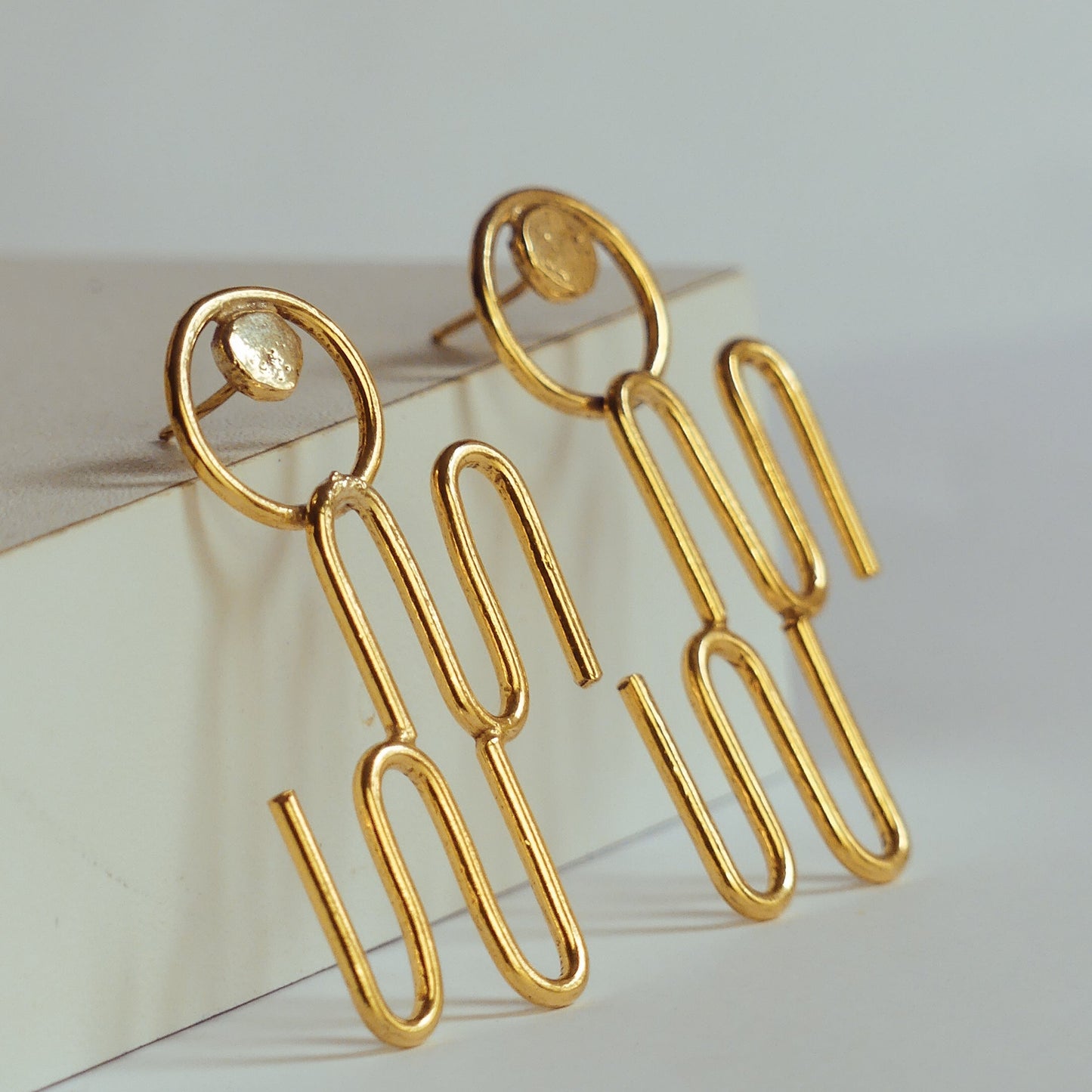 Boucles d’oreille N – Nom