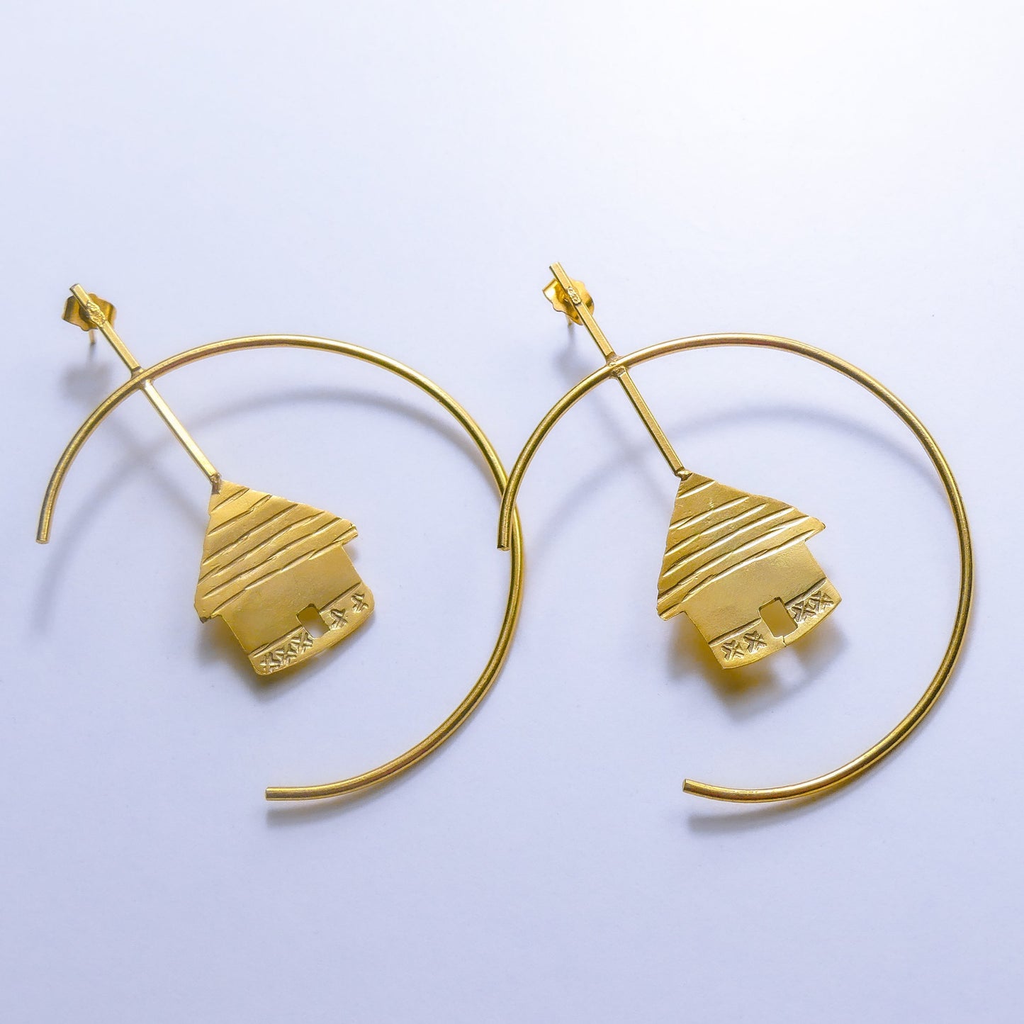 Boucles d'oreille en Bronze Ndew Case